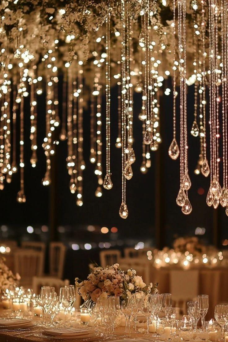 Hanging crystal lights over a celebration table